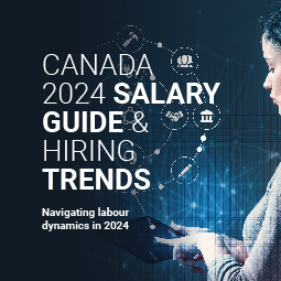 A blueish image with a woman on the right-hand side with the following words in white: Canada 2024 Salary Guide & Hiring Trends. Navigating labour dynamics.