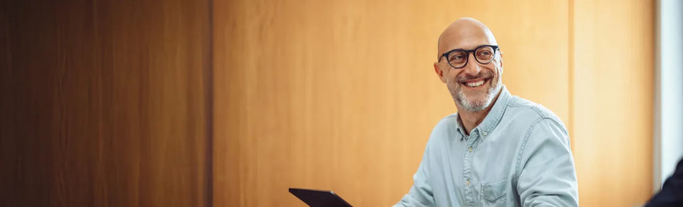 Blonde woman looking at desktop