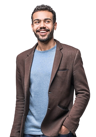 A man smiling with a brown jacket and blue sweater.