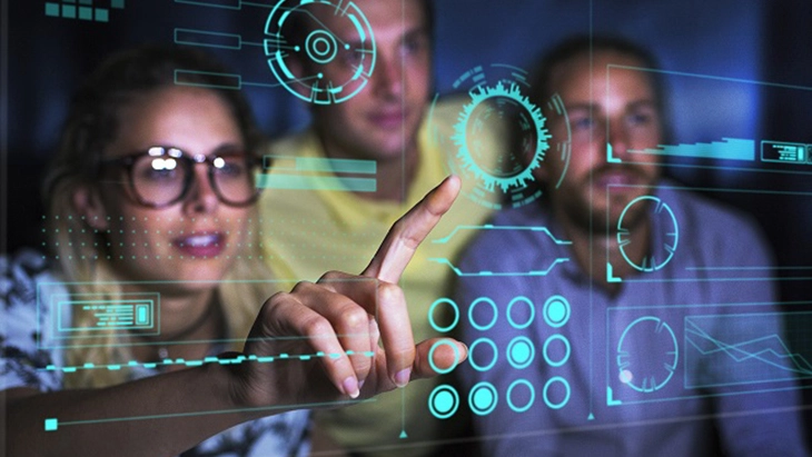 people looking at a digital space
