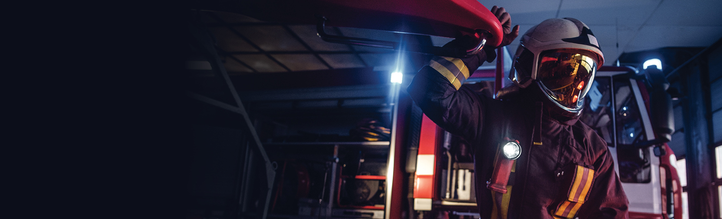 Firefighter on fire truck
