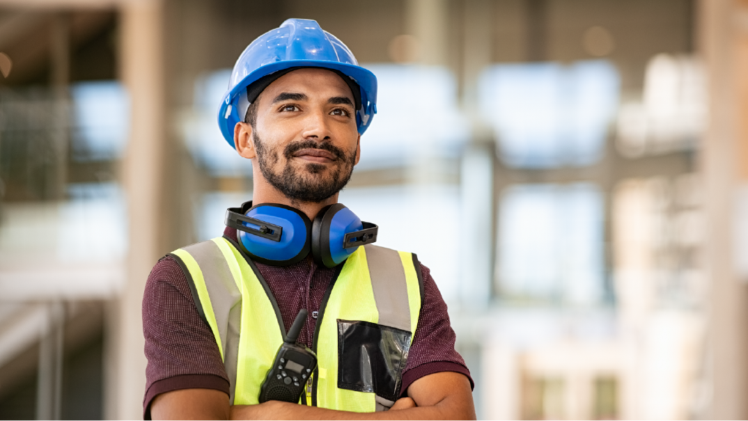 A man in construction gear in a construction site.